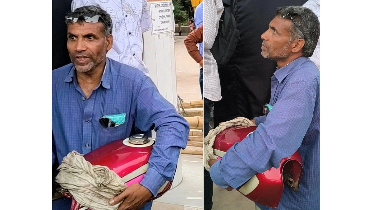 মোটরসাইকেলের ট্যাংকি হাতে নিয়ে পাম্পে আনোয়ার