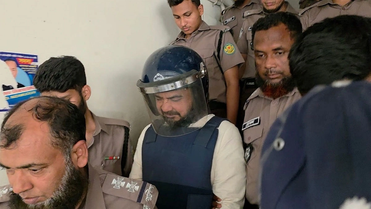 কাঠগড়ায় প্রথমে মনমরা, পরে মুচকি হাসিতে আফজাল নাছের