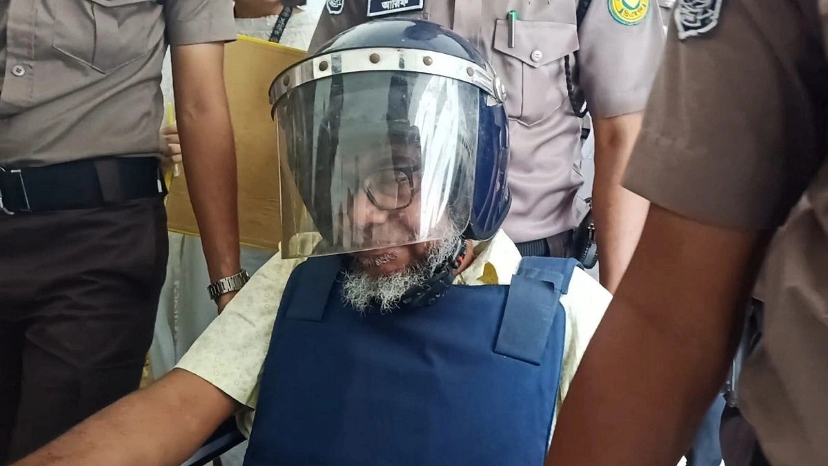 Former Home Secretary in Court in a Wheelchair