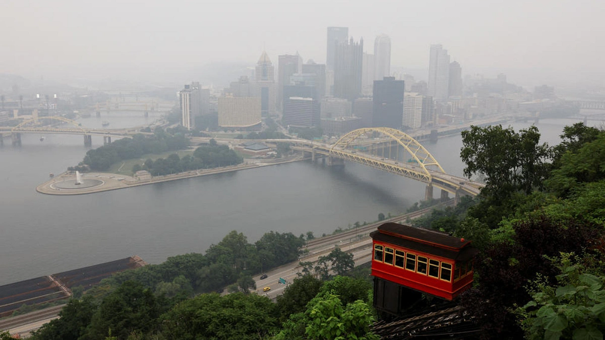 Smoke, fire, floods: US faces triple extreme summer weather threats