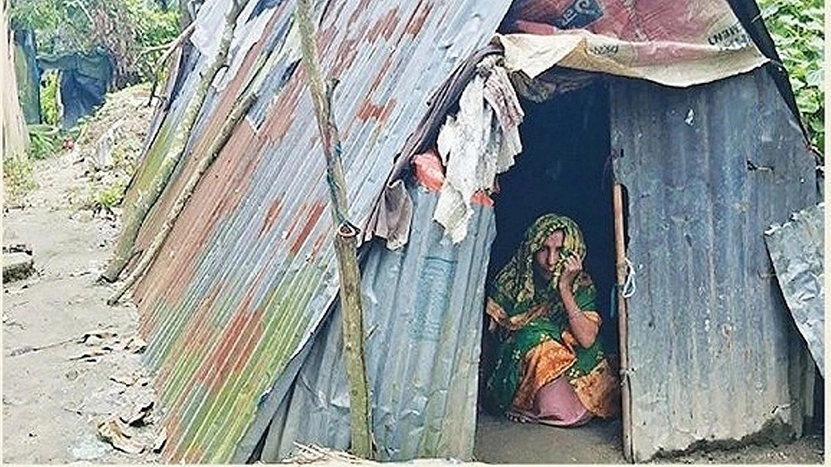 Firoza moves from shack to new home