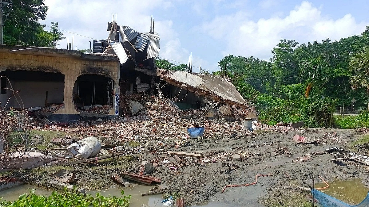 Awami League leader’s house demolished, belongings looted, then set on fire
