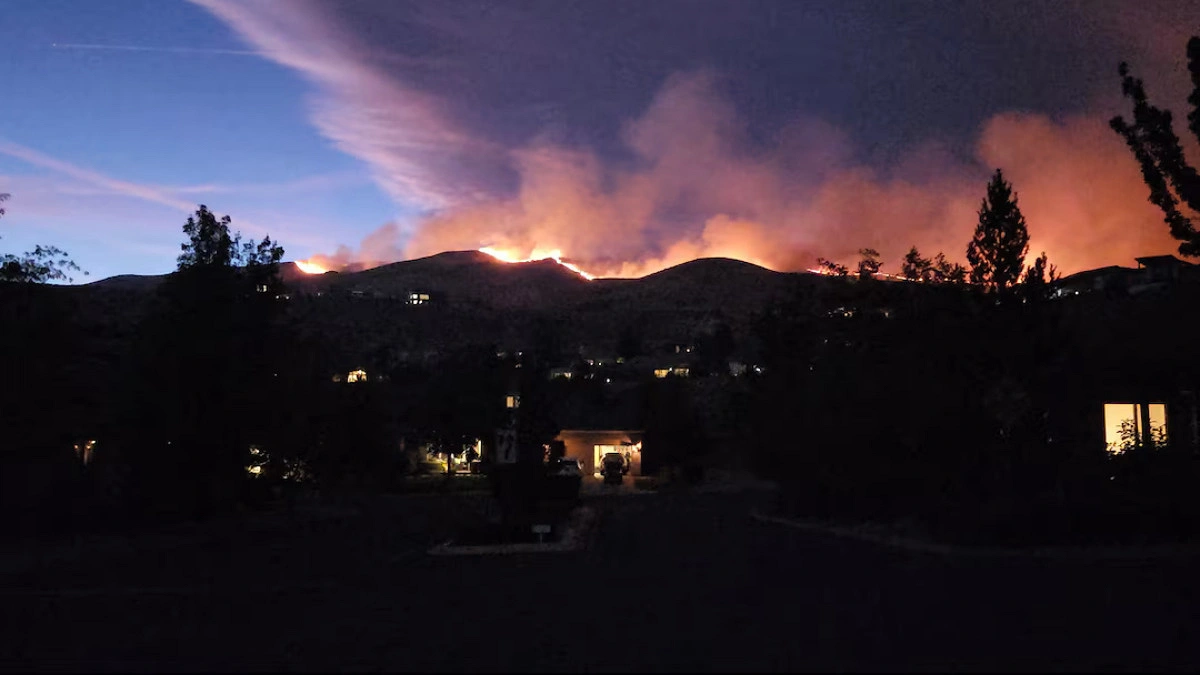 Wind-fueled wildfire sparks mass evacuations in Nevada of USA