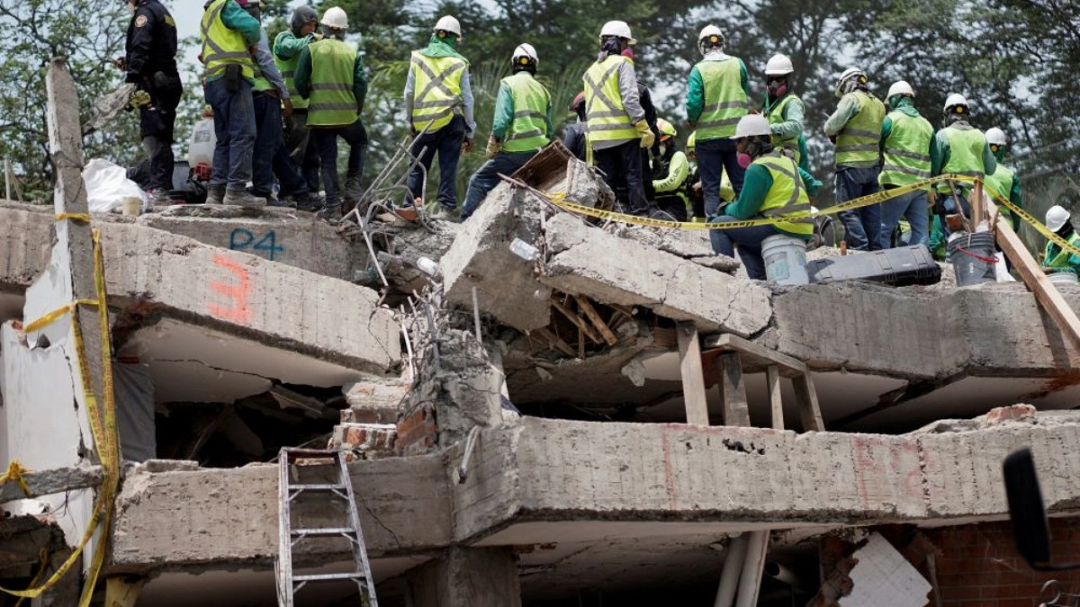 Thousands evacuate after Indonesia quake kills 51, cuts roads